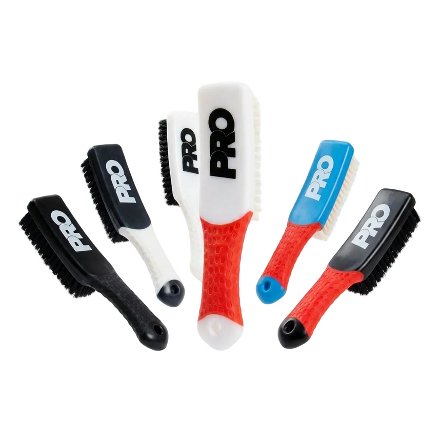 Set of fivePRO brushes with different colored handles on a white background