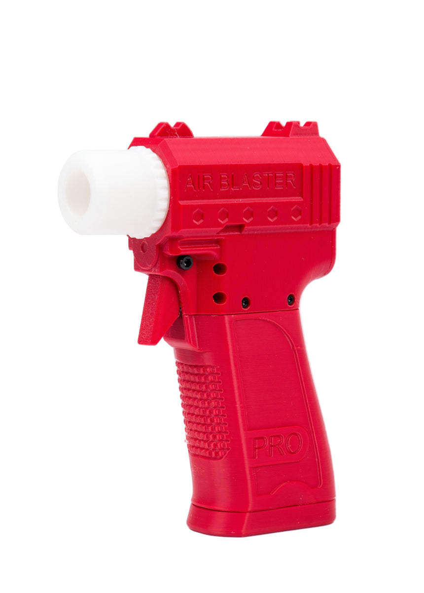 Red toy blaster on a white background