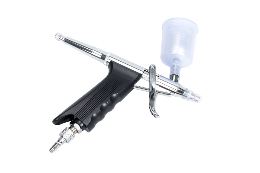 Airbrush gun on a white background