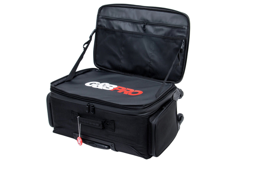 Black travel bag with open top on a white background
