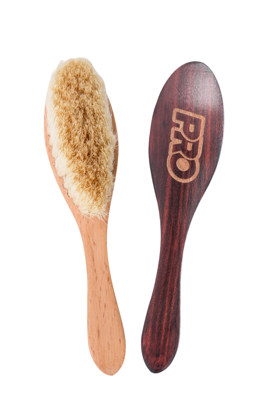 Two hairbrushes, one with bristles and wooden handle, the other with wooden handle and brand logo, on a white background.