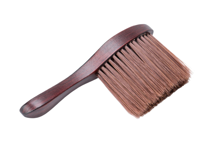 Wooden brush with bristles on a white background
