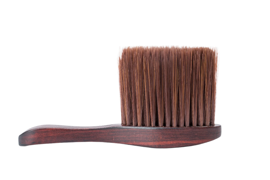 Wooden brush with brown bristles on a white background