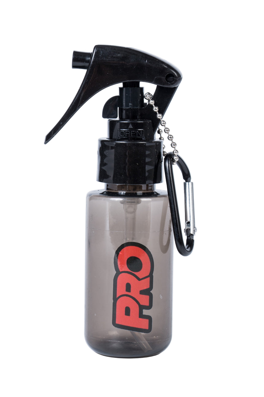 Clear spray bottle with black nozzle and red 'PRO' logo on a white background