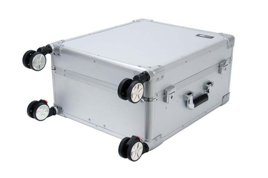 Silver suitcase with wheels on a white background