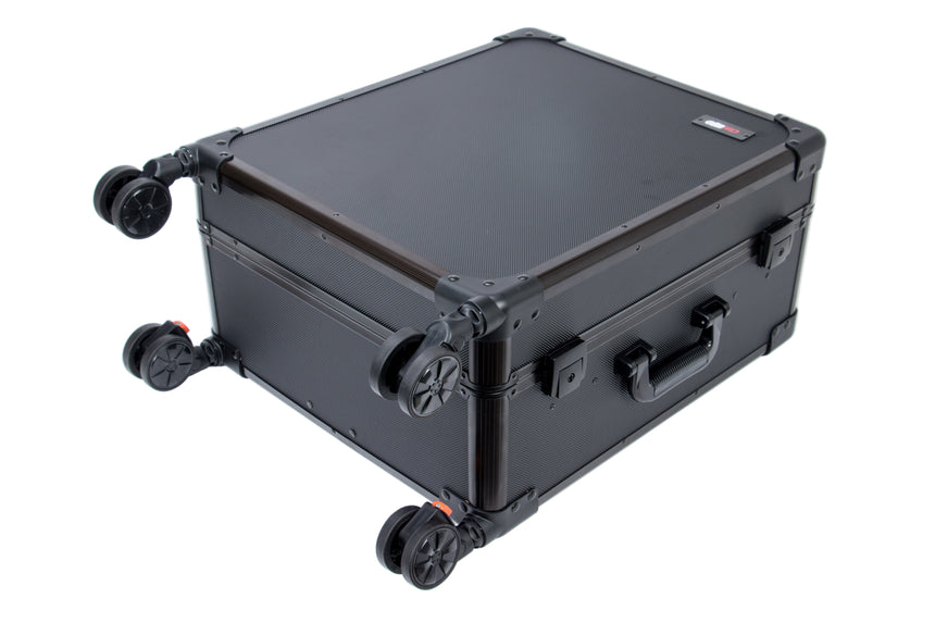 Black suitcase with wheels on a white background