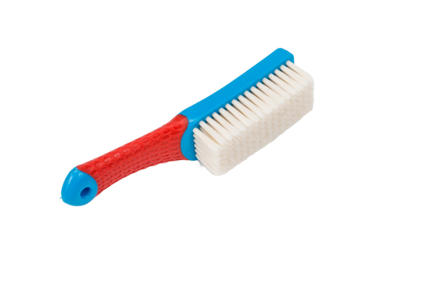 Cleaning brush with red handle and blue bristles on a white background