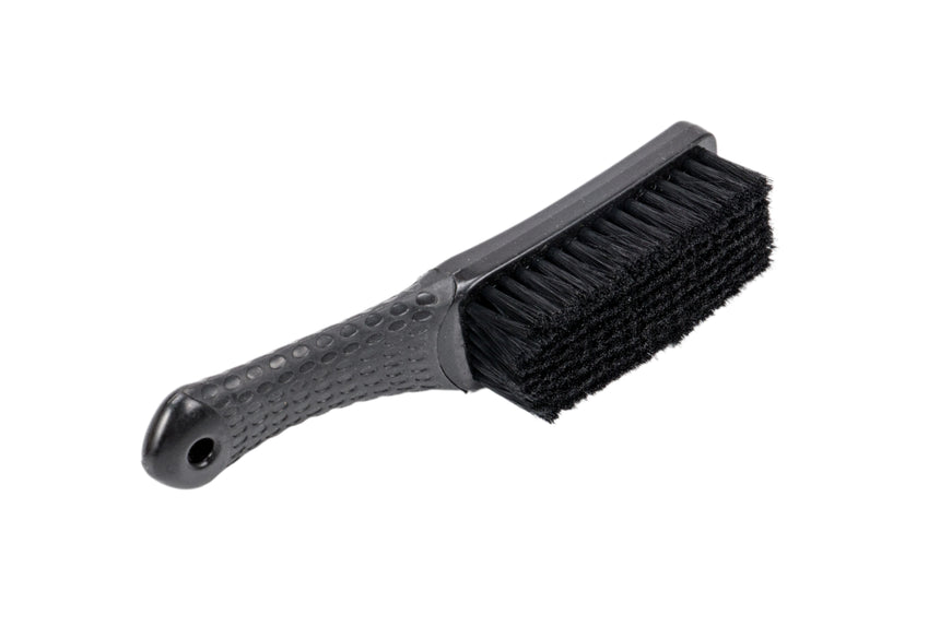 Black brush with bristles on a white background