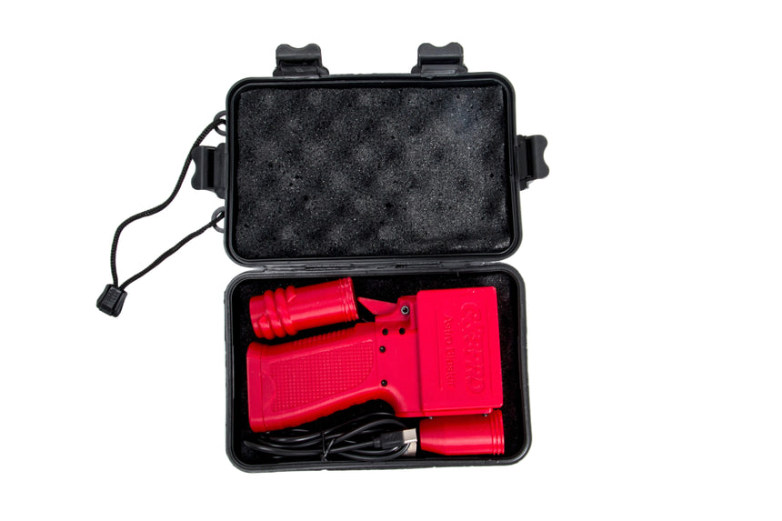 Red handheld device with black cable inside a black carrying case on a white background