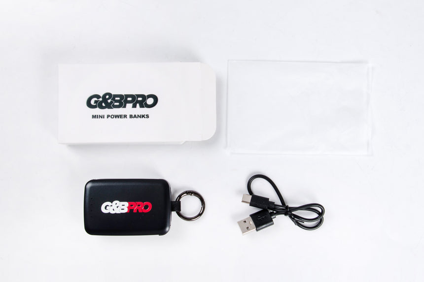 G&G Pro power bank with keychain and USB cable on a white background