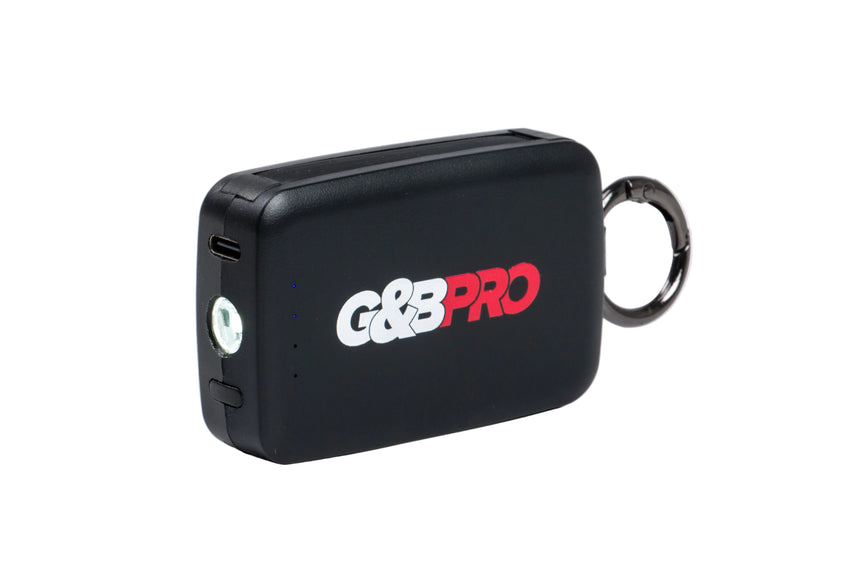Black G&B Pro device with a keychain on a white background