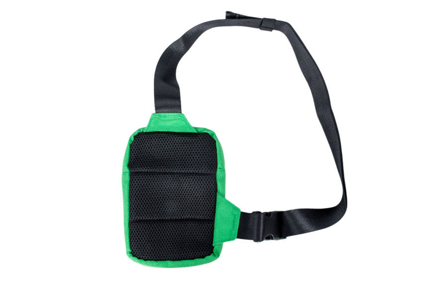 Green and black crossbody bag on a white background