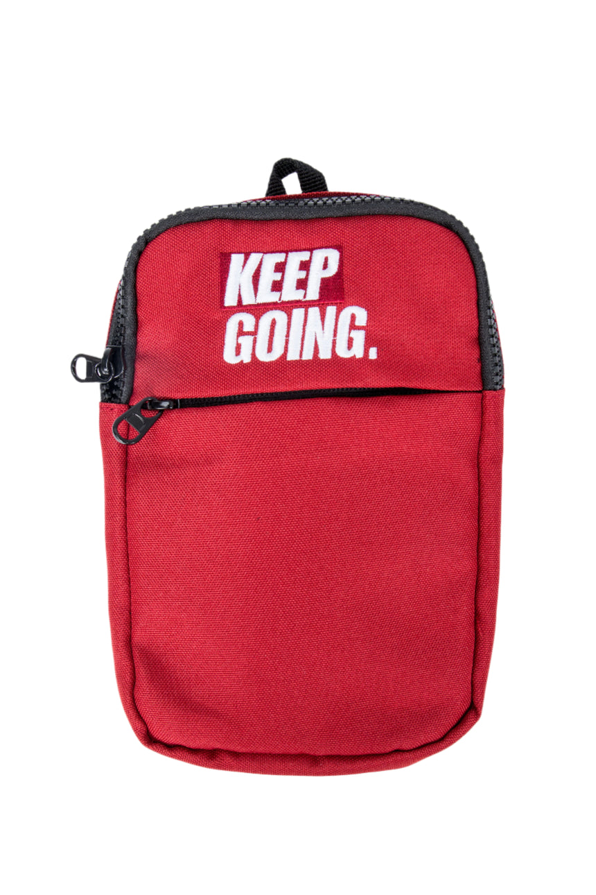 Red pouch with 'KEEP GOING' text on a white background
