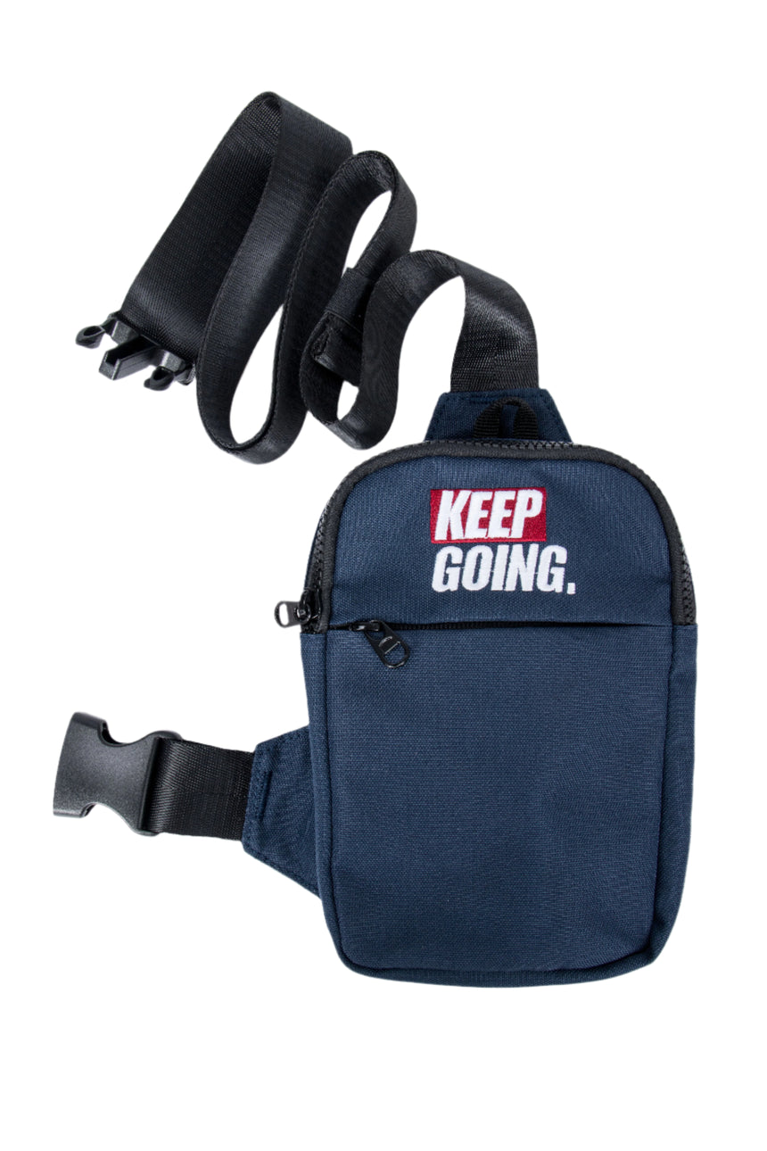 Navy blue waist bag with 'KEEP GOING.' text on a white background
