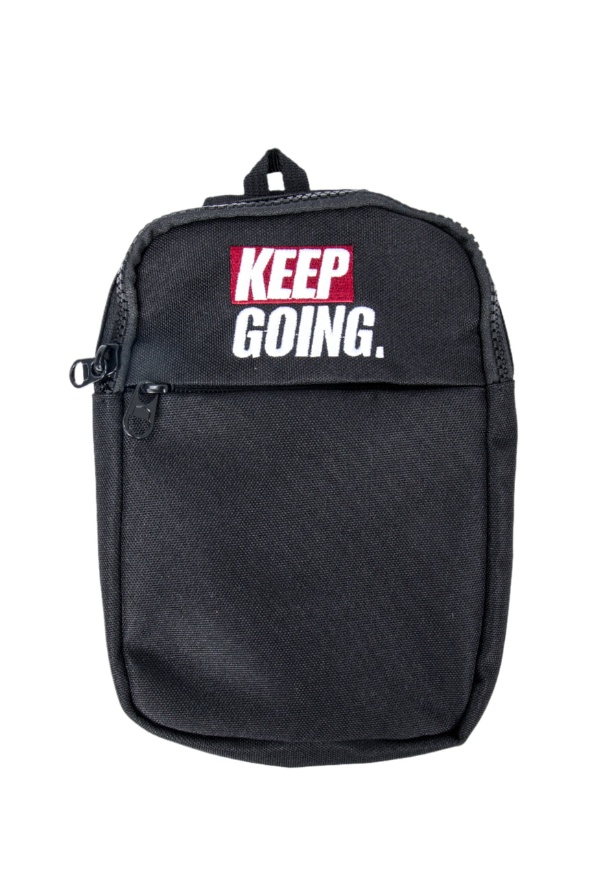 Black backpack with 'KEEP GOING.' text on a white background