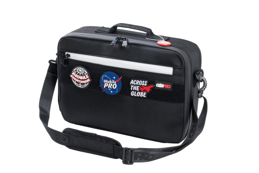 Black bag with patches on a white background