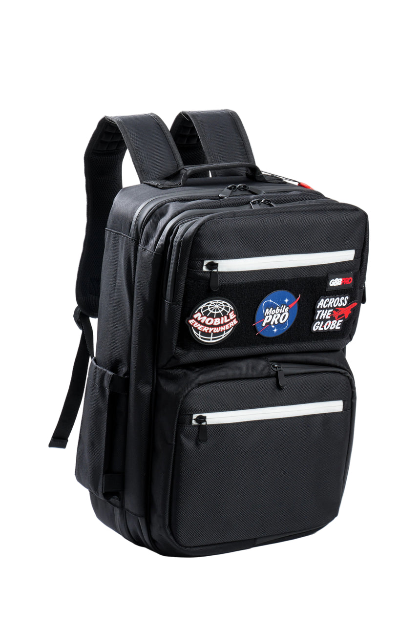 Black backpack with patches on a white background