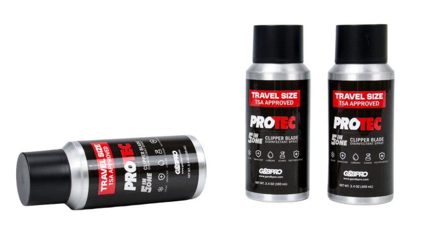 Two travel-sized ProTec clipper blade containers on a white background