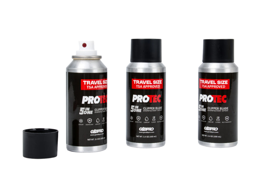 Three travel-sized PRO-TEC hair clipper blade containers on a white background