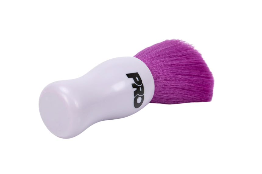 White brush with purple bristle head labeled 'PRO' on a white background