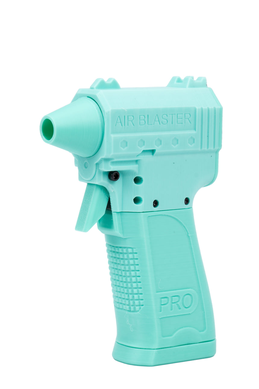 Turquoise air blaster gun on a white background
