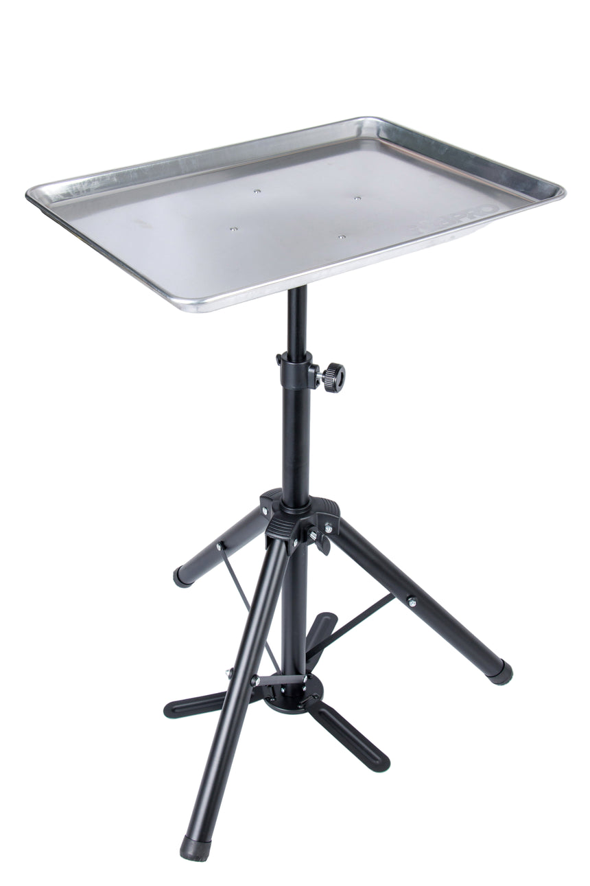 Tripod stand with a metal tray on a white background