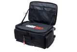 Black travel bag with open top on a white background