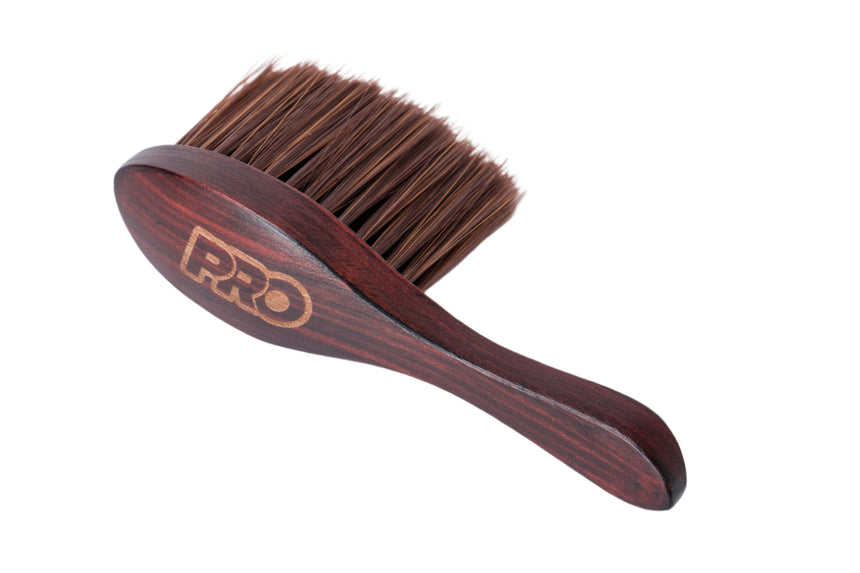 Wooden brush with brown bristles on a white background