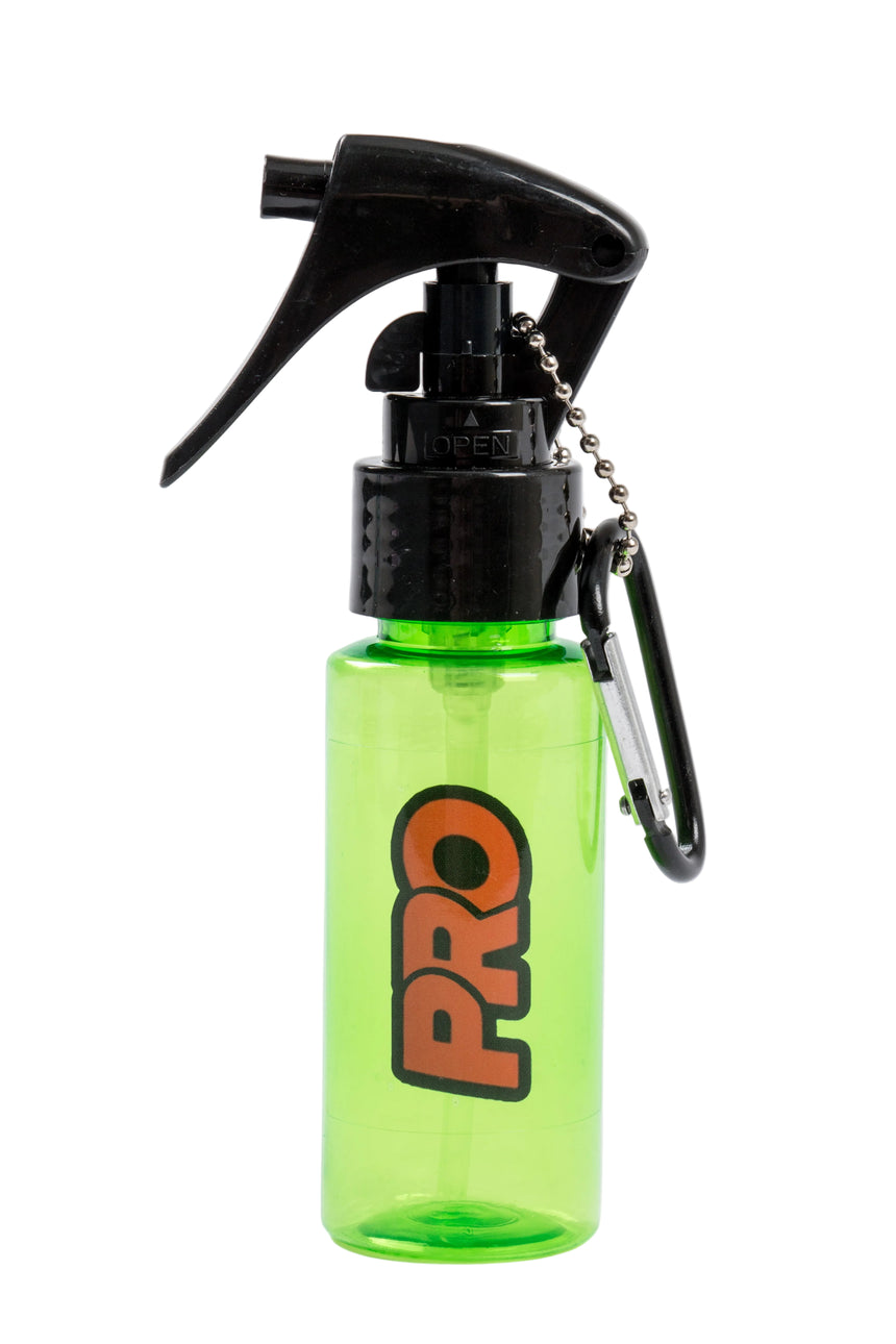 Green spray bottle with black nozzle and 'PRO' branding on a white background