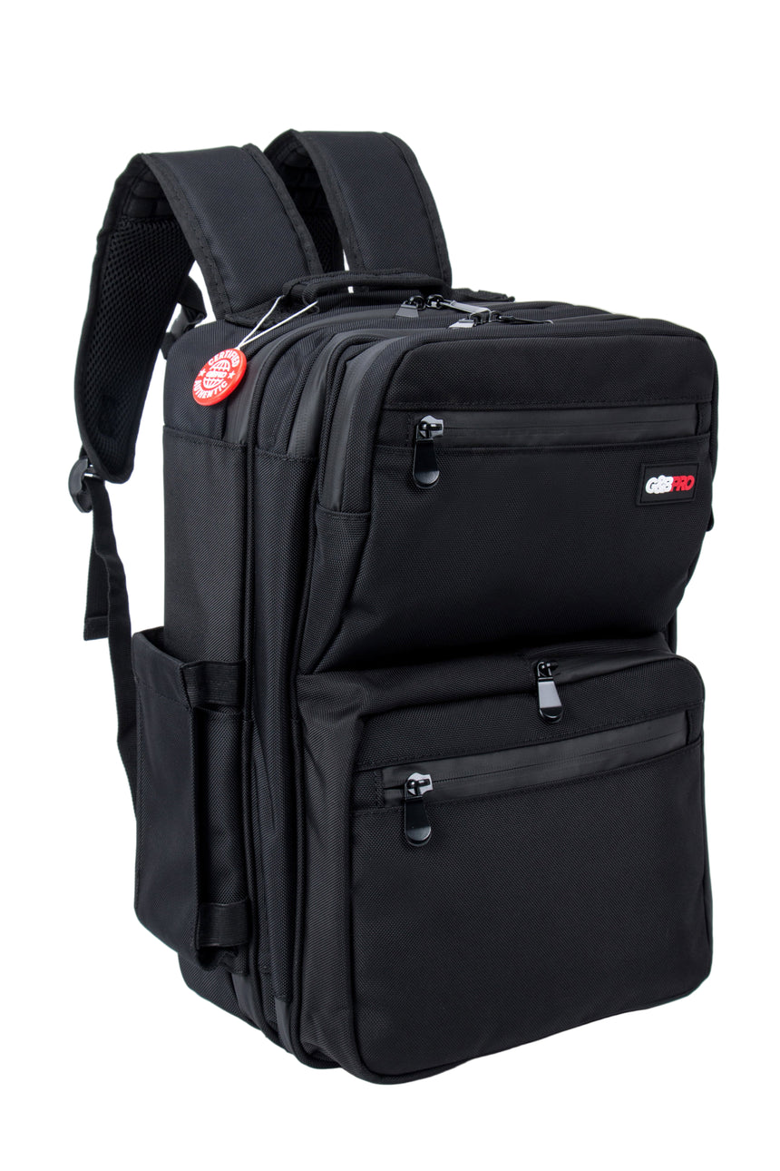 Black backpack with multiple pockets and zippers on a white background