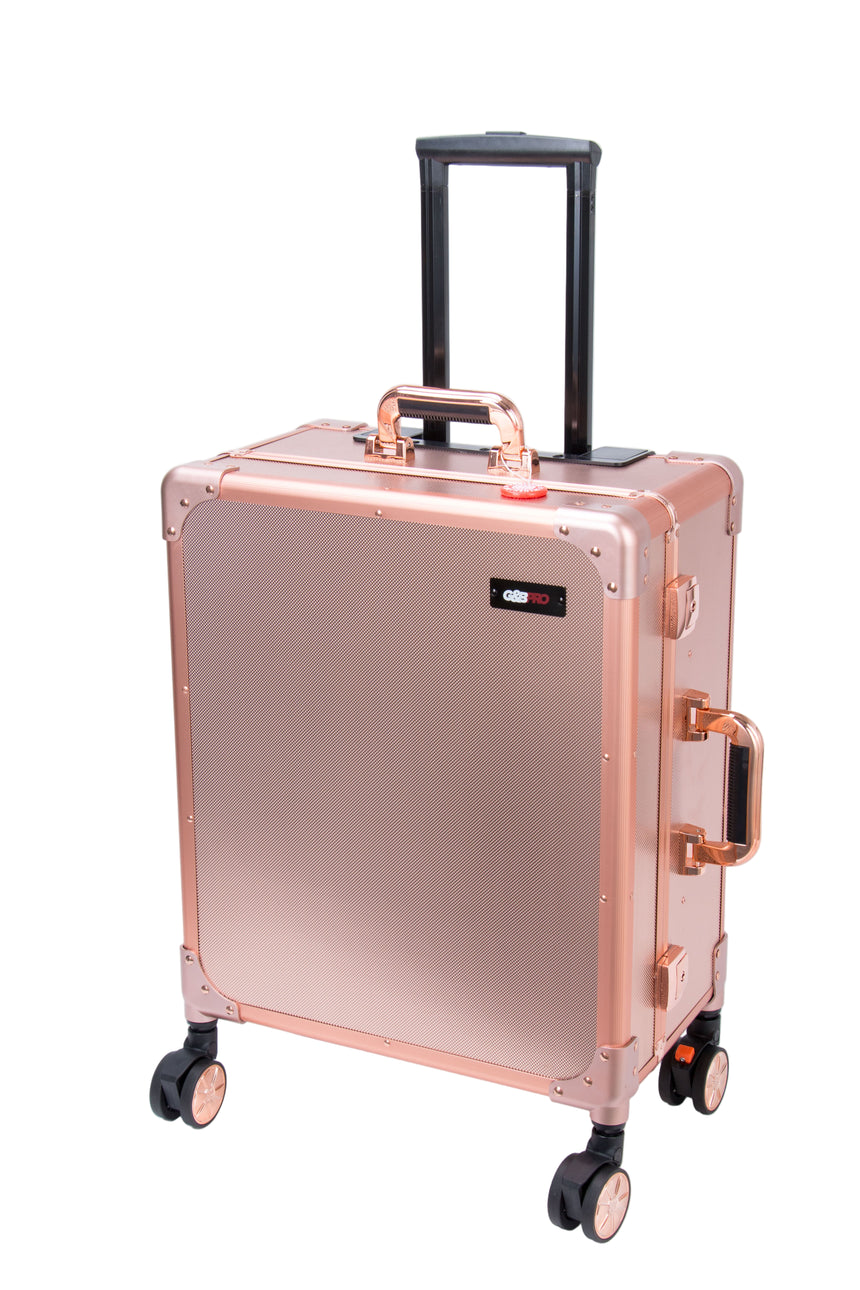 Rose gold suitcase with wheels on a white background
