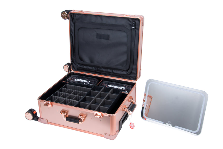 Rose gold briefcase with compartments on a white background