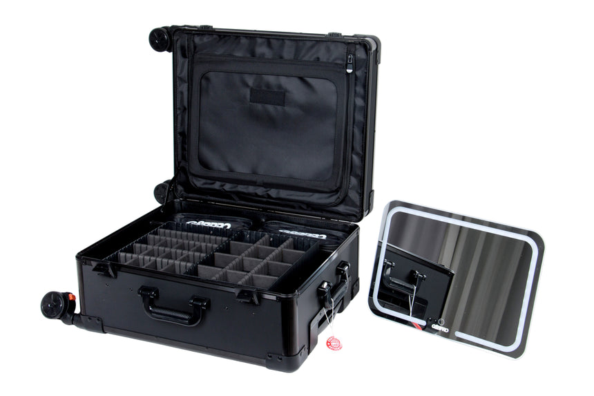 Black travel case with compartments on a white background