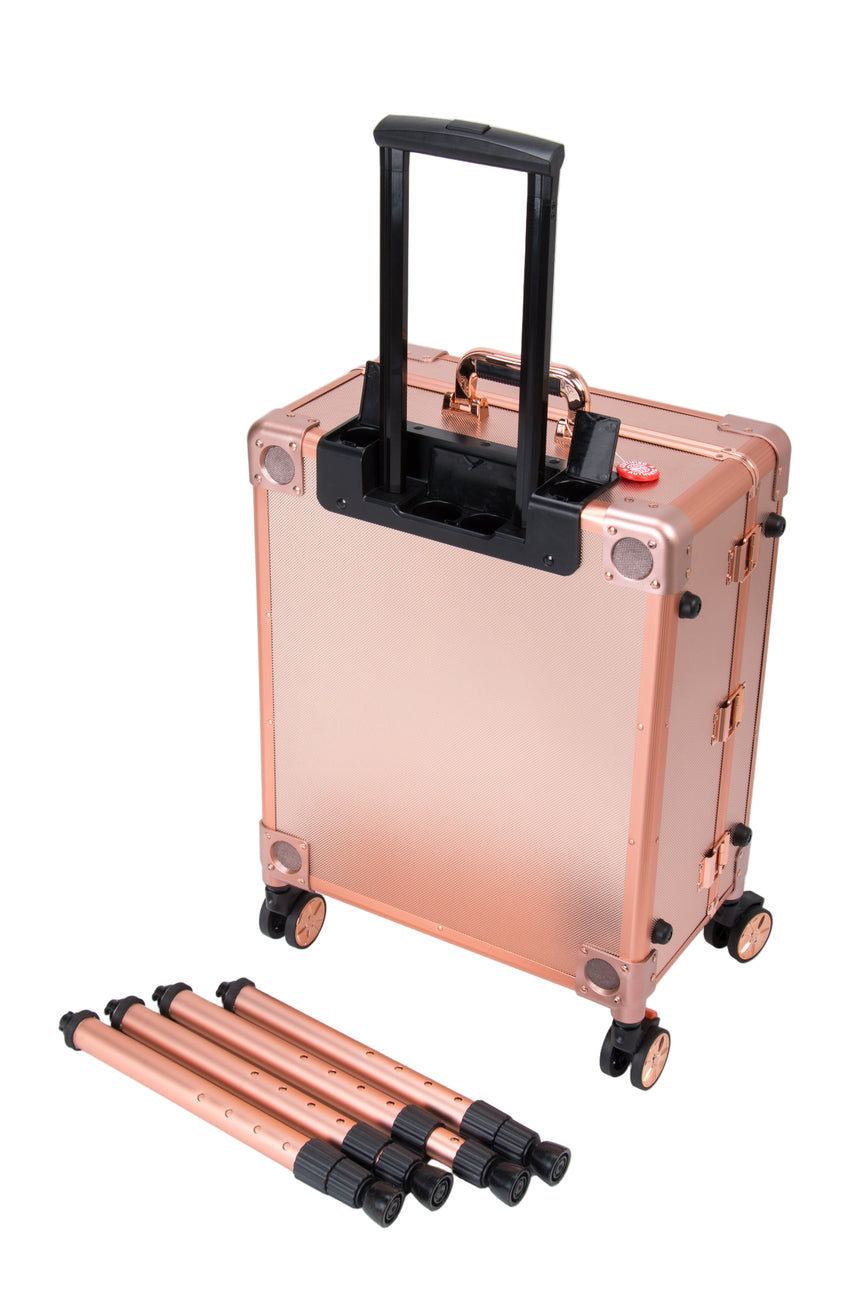 Rose gold suitcase with black handle and wheels on a white background