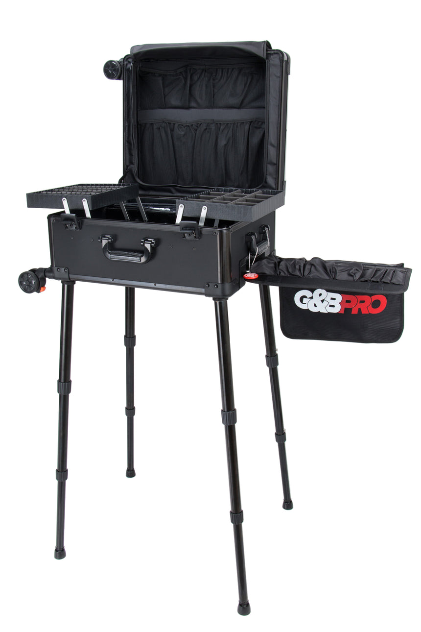 Black portable workbench with adjustable legs and a carrying bag on a white background