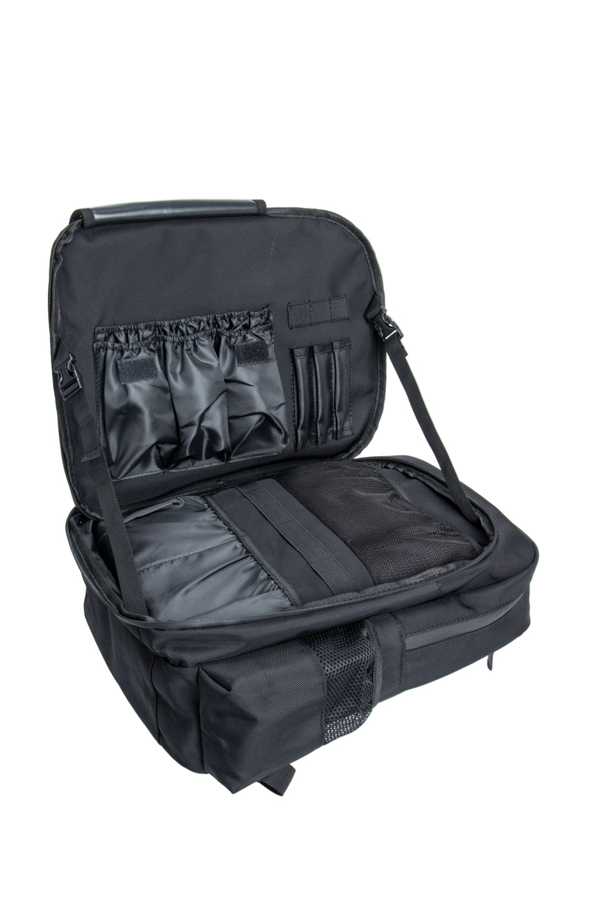 Black backpack with open compartments on a white background