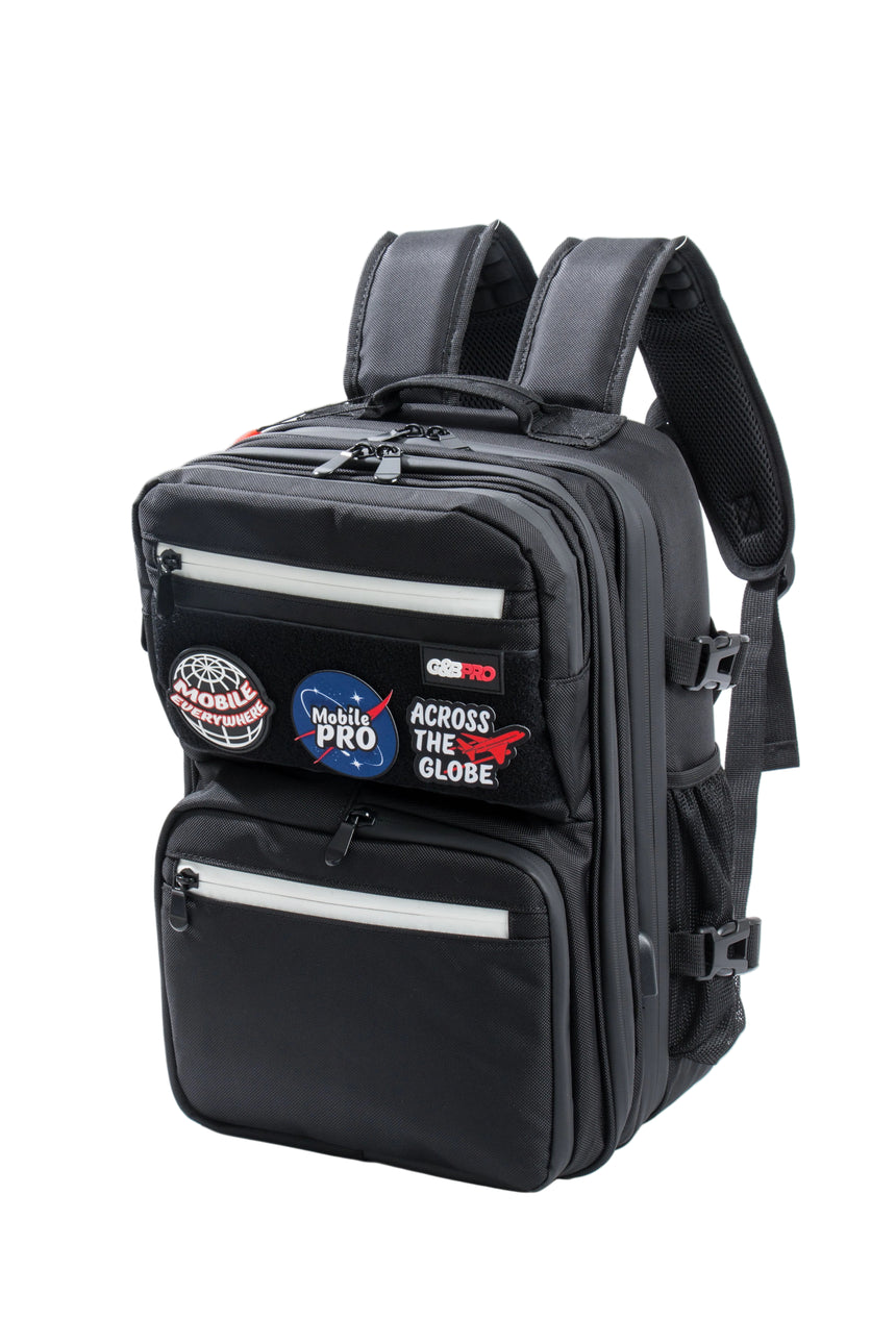 Black backpack with patches on a white background