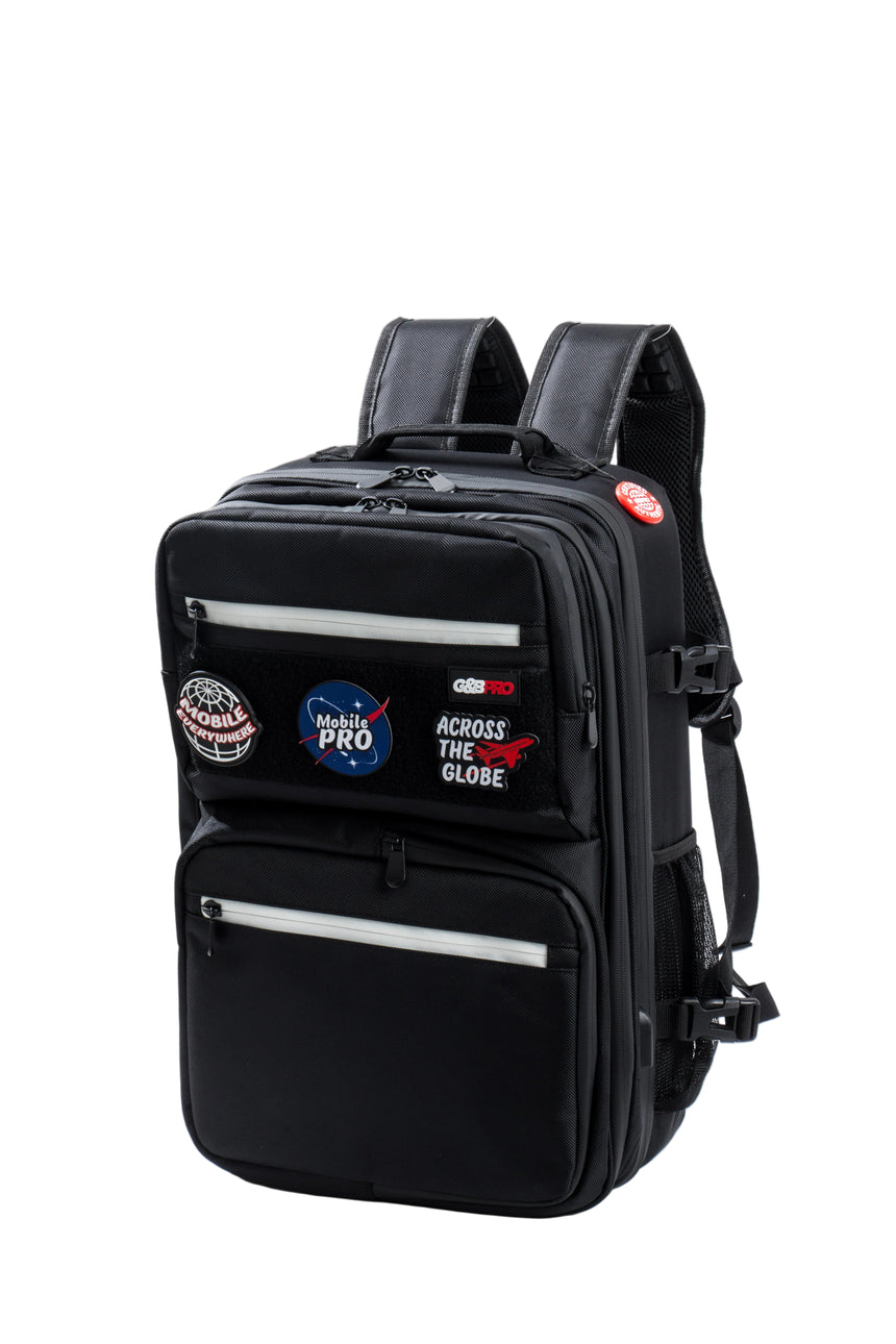 Black backpack with patches on a white background