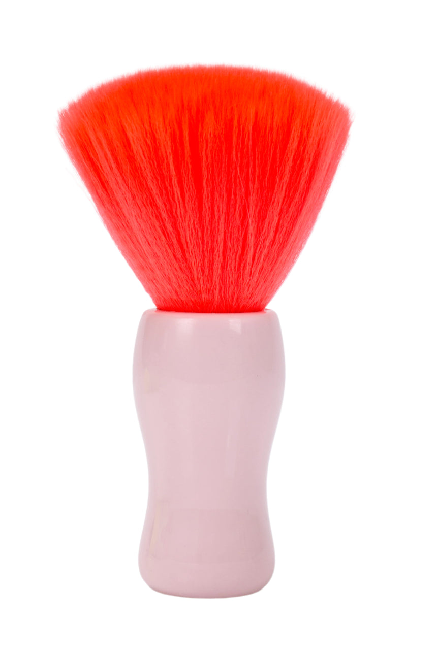 Brush with red bristles and a pink handle on a white background