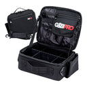 A black compact case with multiple compartments, shown open to display the interior, with the brand 'G&B PRO' visible on the exterior.
